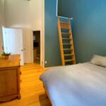 King bed, dresser, and work remote yoga loft Mt. Rainier vacation