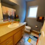 Full, colorful bathroom at Mt. Rainier area cabin